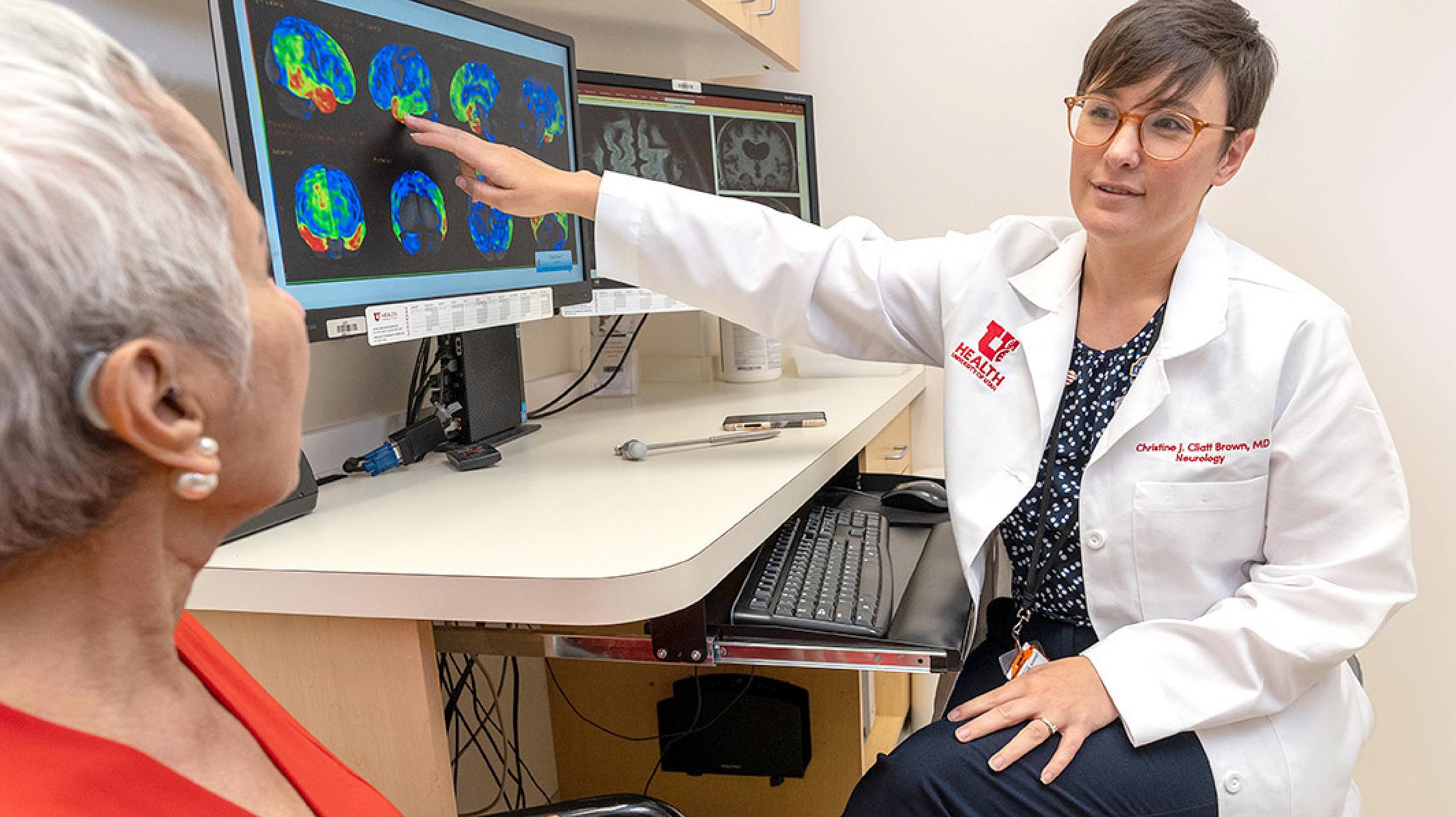 U of U Health Neurologist talking to a patient