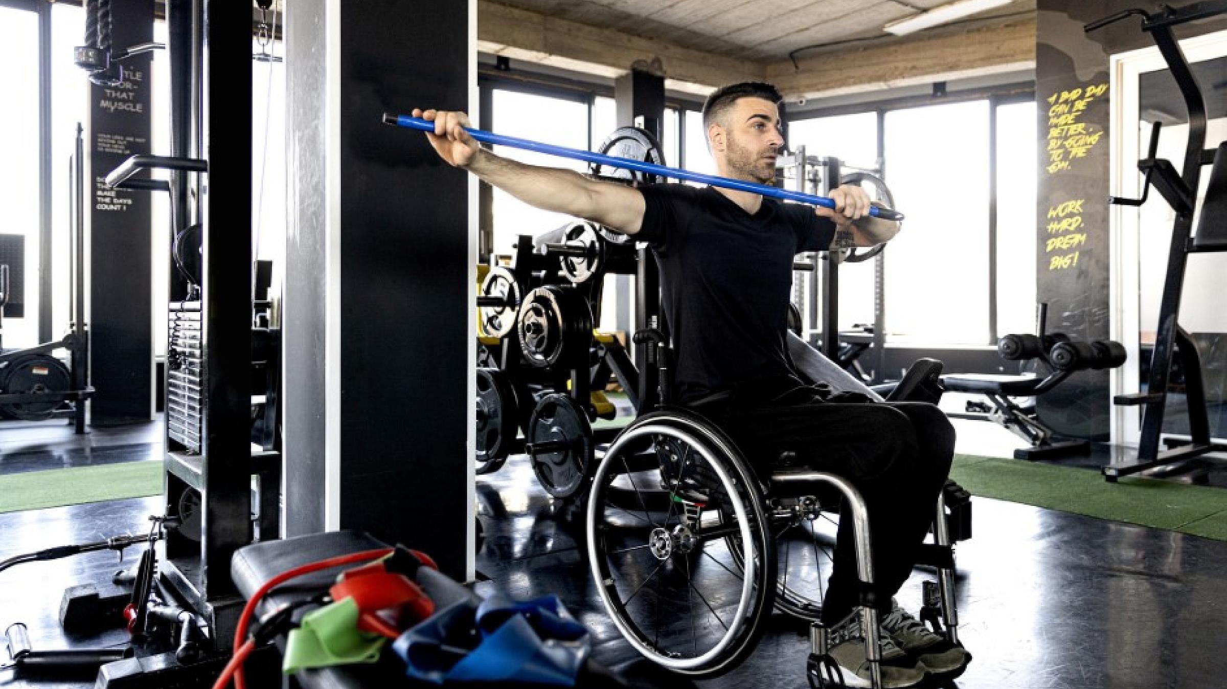 Acute spinal cord injury patient doing rehabilitation exercises