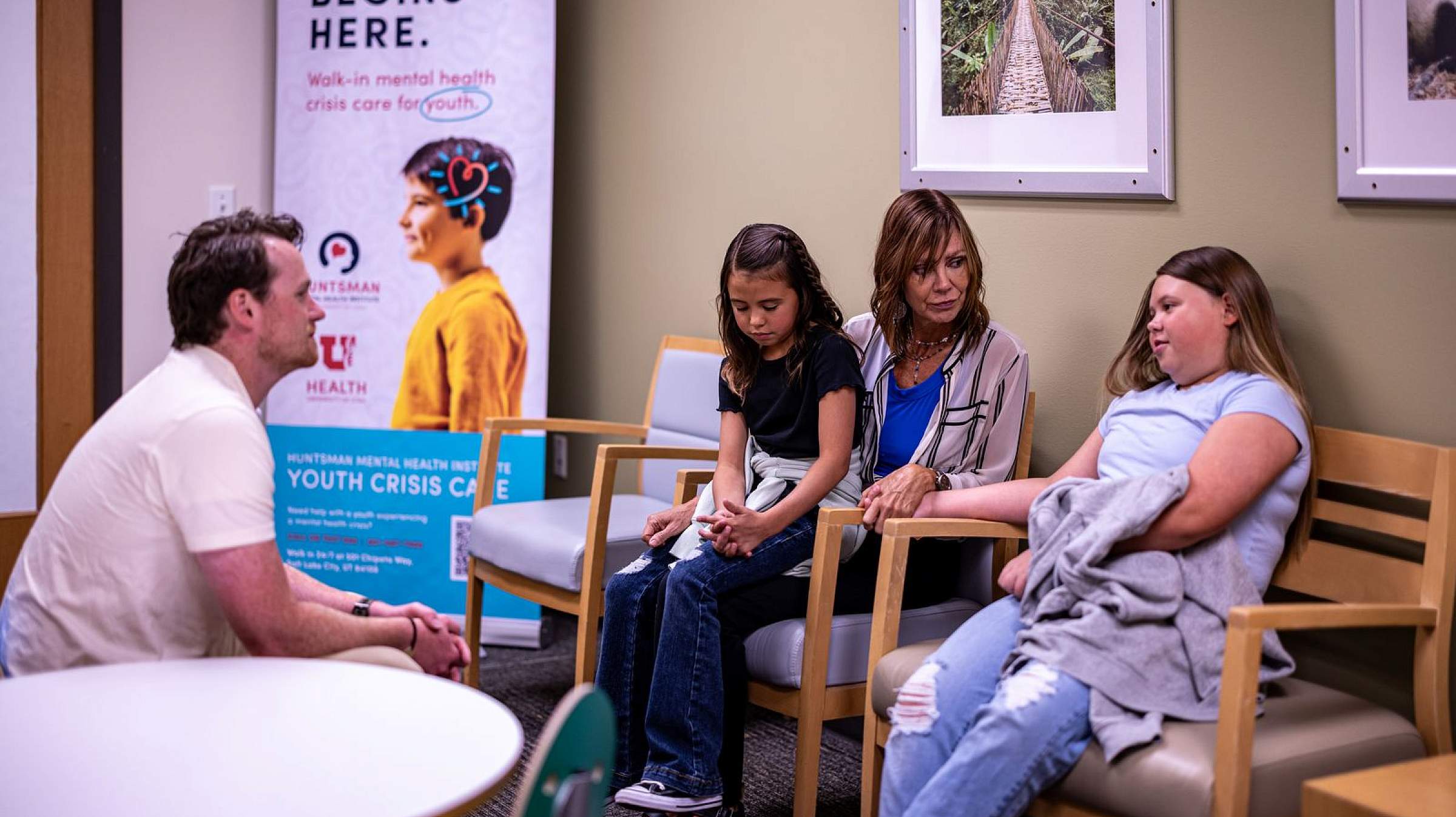 Doctor speaking with a family in the Youth Crisis Care program